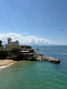 Explore the stunning coastline and historic architecture of Biarritz, France on a sunny summer day.